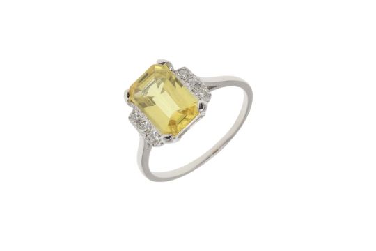 A Natural Yellow Sapphire and Diamond Art Deco Ring
