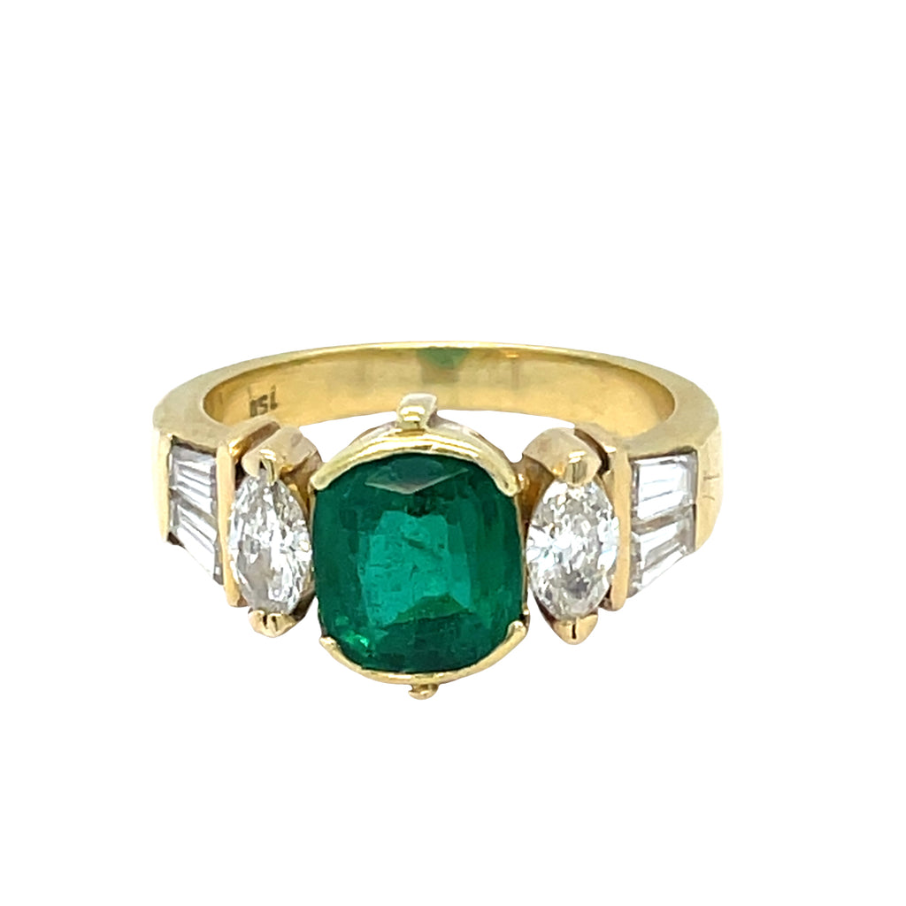 An Emerald and Diamomd 18ct Gold Ring